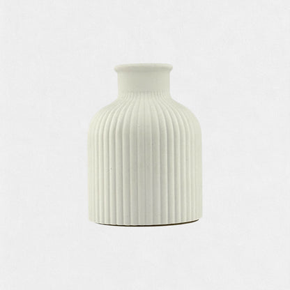 Decorative vase with vertical relief