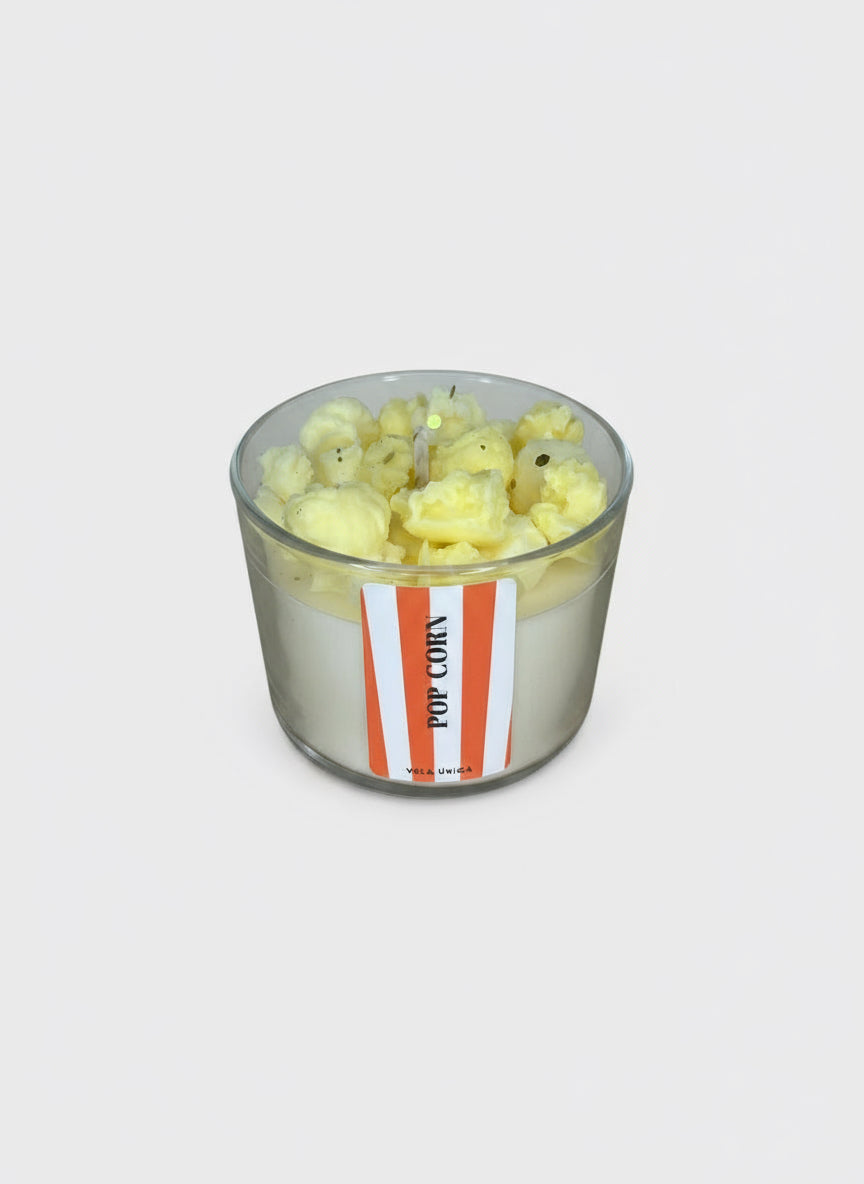 Vela aromática Palomitas de Vela Única, fragancia fresca y ligera con notas de algodón y brisa marina, elaborada con cera vegetal premium.