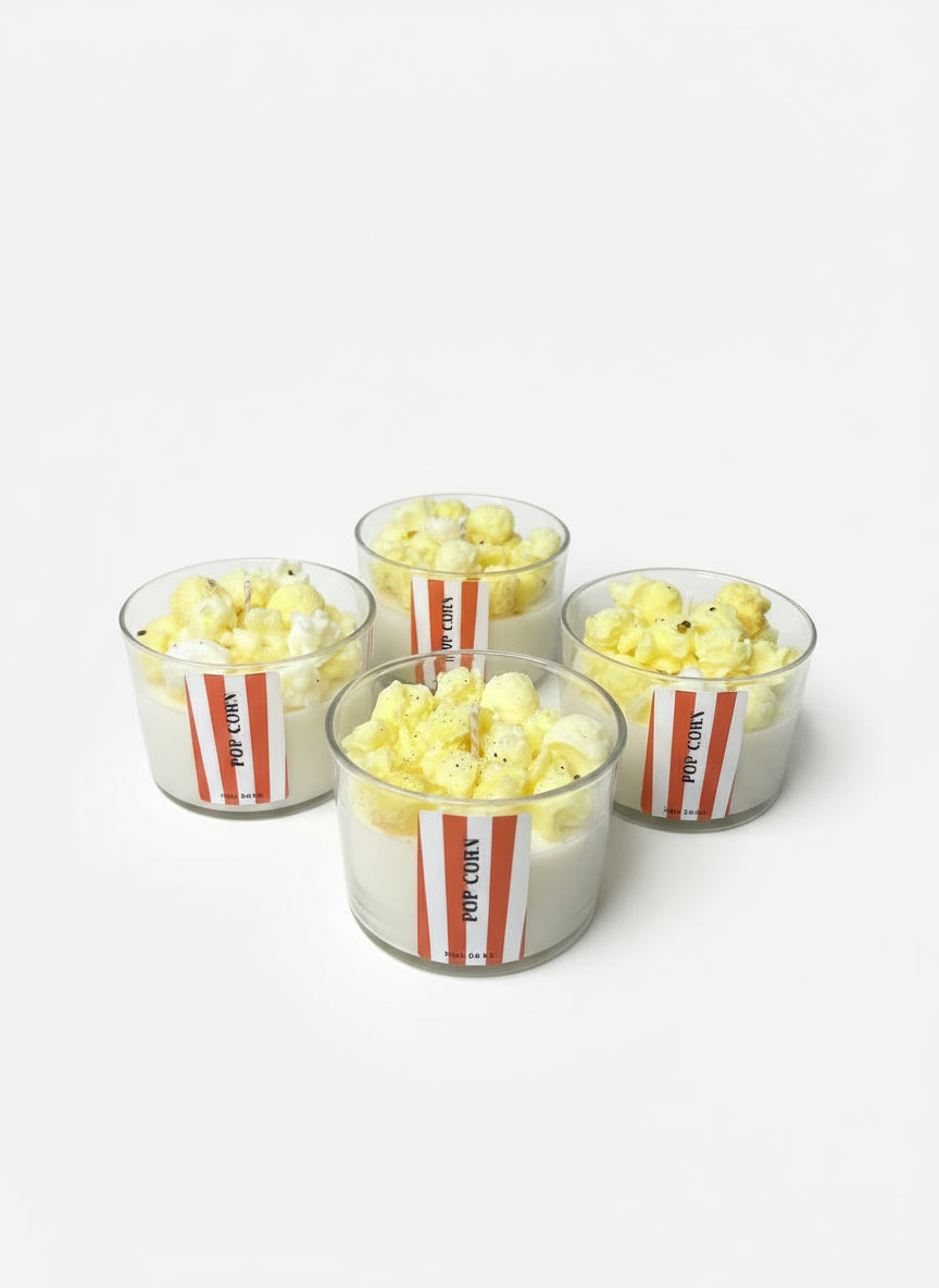 Vela aromática Palomitas de Vela Única, fragancia fresca y ligera con notas de algodón y brisa marina, elaborada con cera vegetal premium.