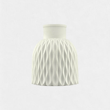 Decorative vase with wavy relief