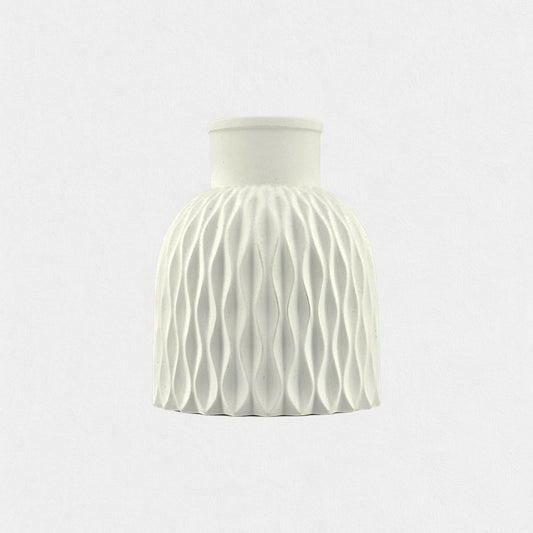 Decorative vase with wavy relief